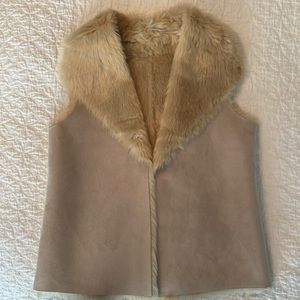Beautiful faux fur vest is your perfect layer for fall!